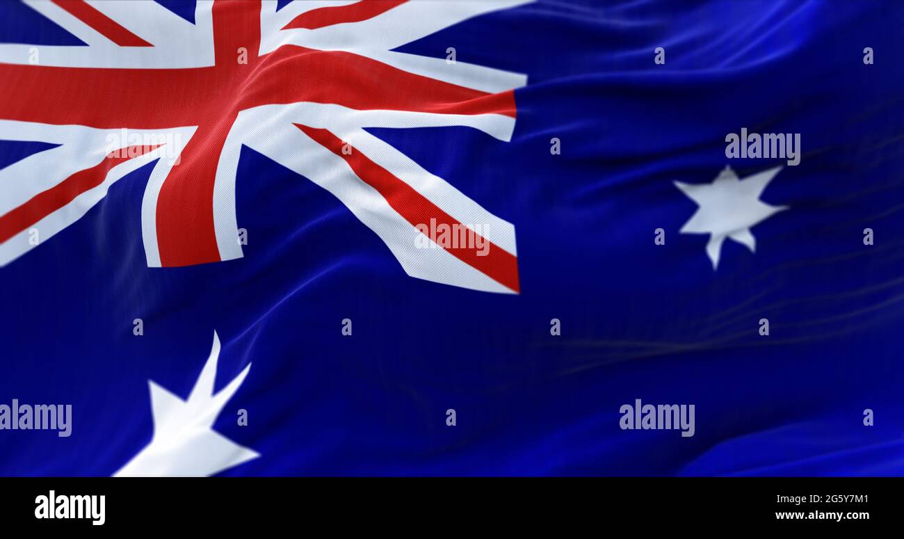 Detail der Nationalflagge Australiens, die im Wind fliegt. Demokratie und Politik. Australien ist eine konstitutionelle Monarchie des Bundestags Stockfoto