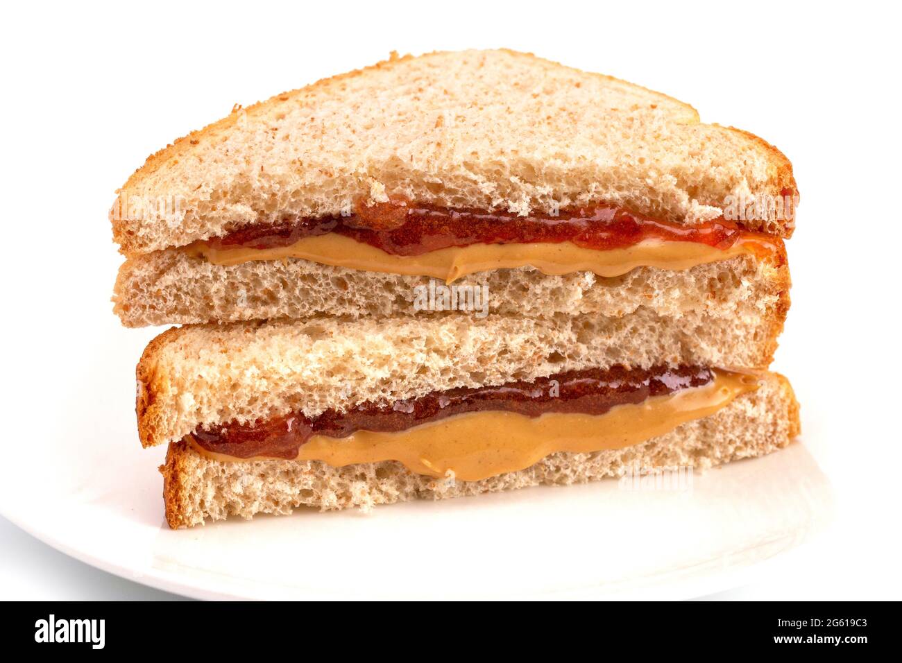 Klassische Erdnussbutter und Strawberry Jelly Sandwich auf Brot aus Weizen Stockfoto