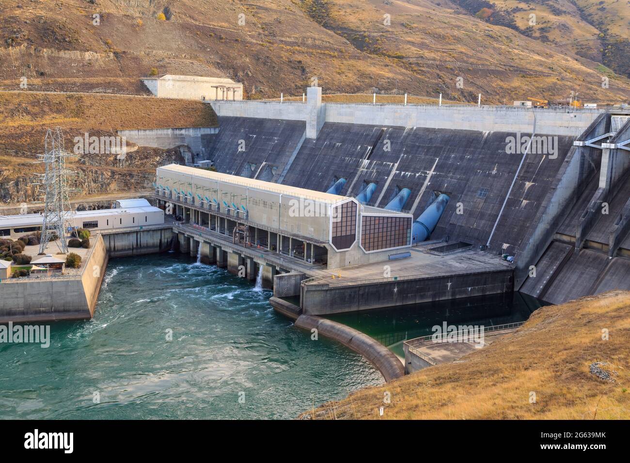 Der Clyde-Staudamm und das Wasserkraftwerk am Clutha River, Otago, Neuseeland Stockfoto