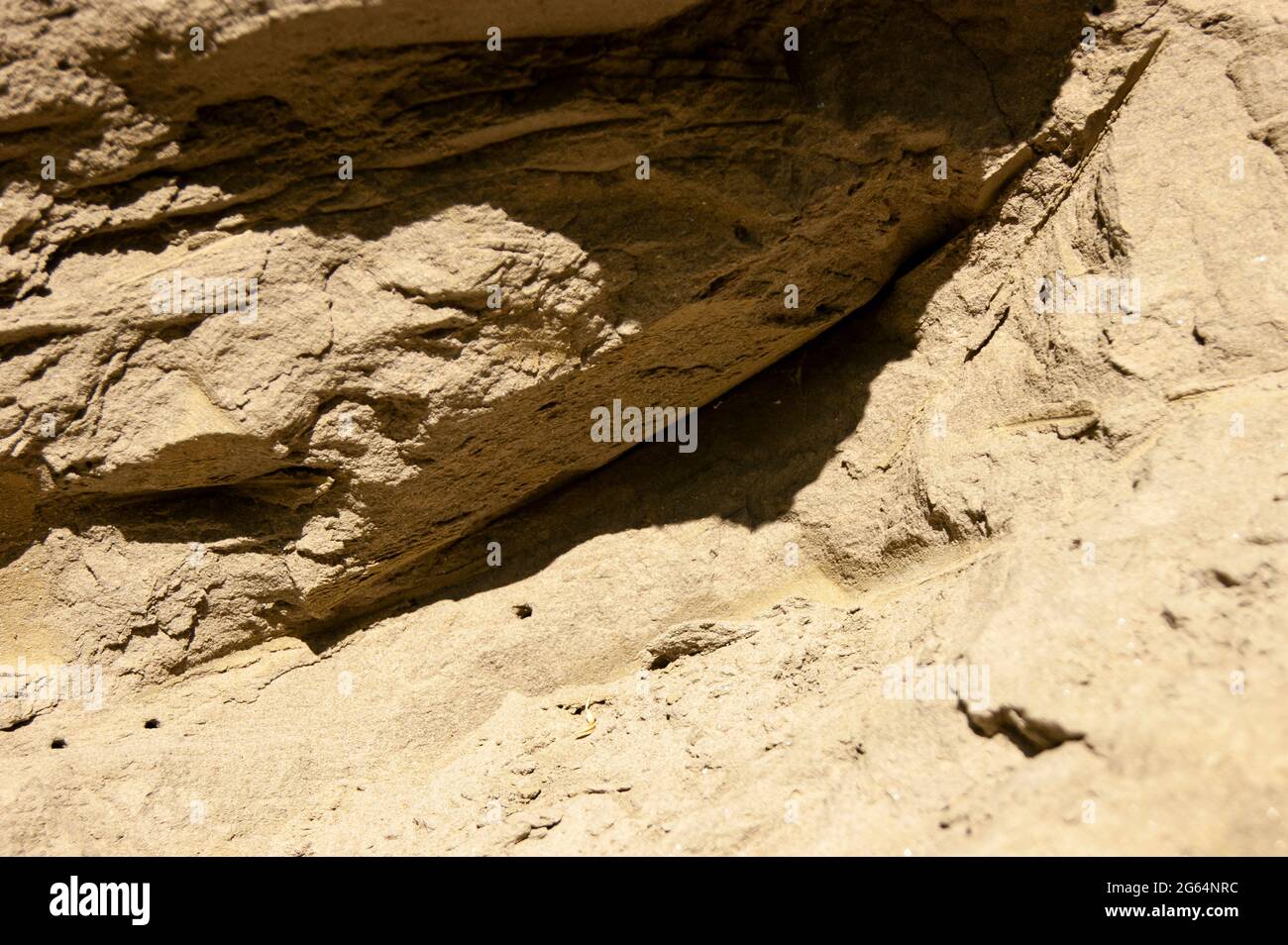 Die Textur des Sandes. Sandsteinbruch. Malerische Textur von Sandsteinen. Stockfoto