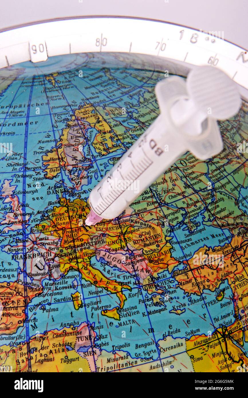 Globe mit Corona-Injektion in Deutschland, Immunisierung gegen Corona, Deutschland Stockfoto