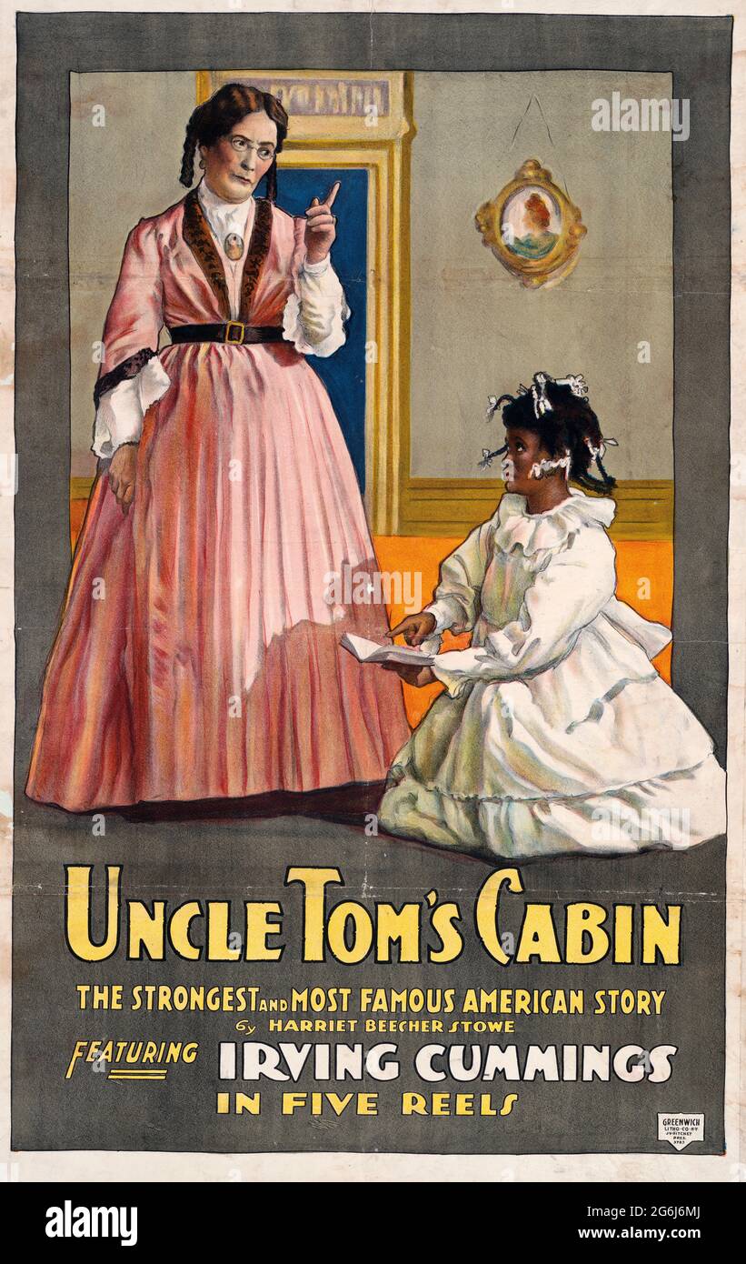 Onkel Toms Hütte mit Irving Cummings - Filmbildposter für 'Onkel Toms Hütte' zeigt eine alte weiße Frau, die mit dem Finger auf ein afroamerikanisches Kind winkt, mit einem Buch, 1914 Stockfoto