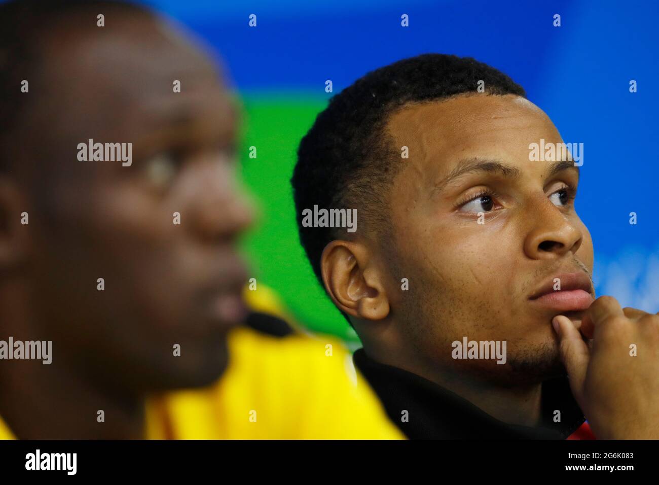 Andre de Grasse aus Kanada porträtiert bei den Olympischen Spielen 2016 in Rio. Sprinter erzielt Bronzemedaille 100m Sprint Rennen letzte Strecke und Feld Stockfoto