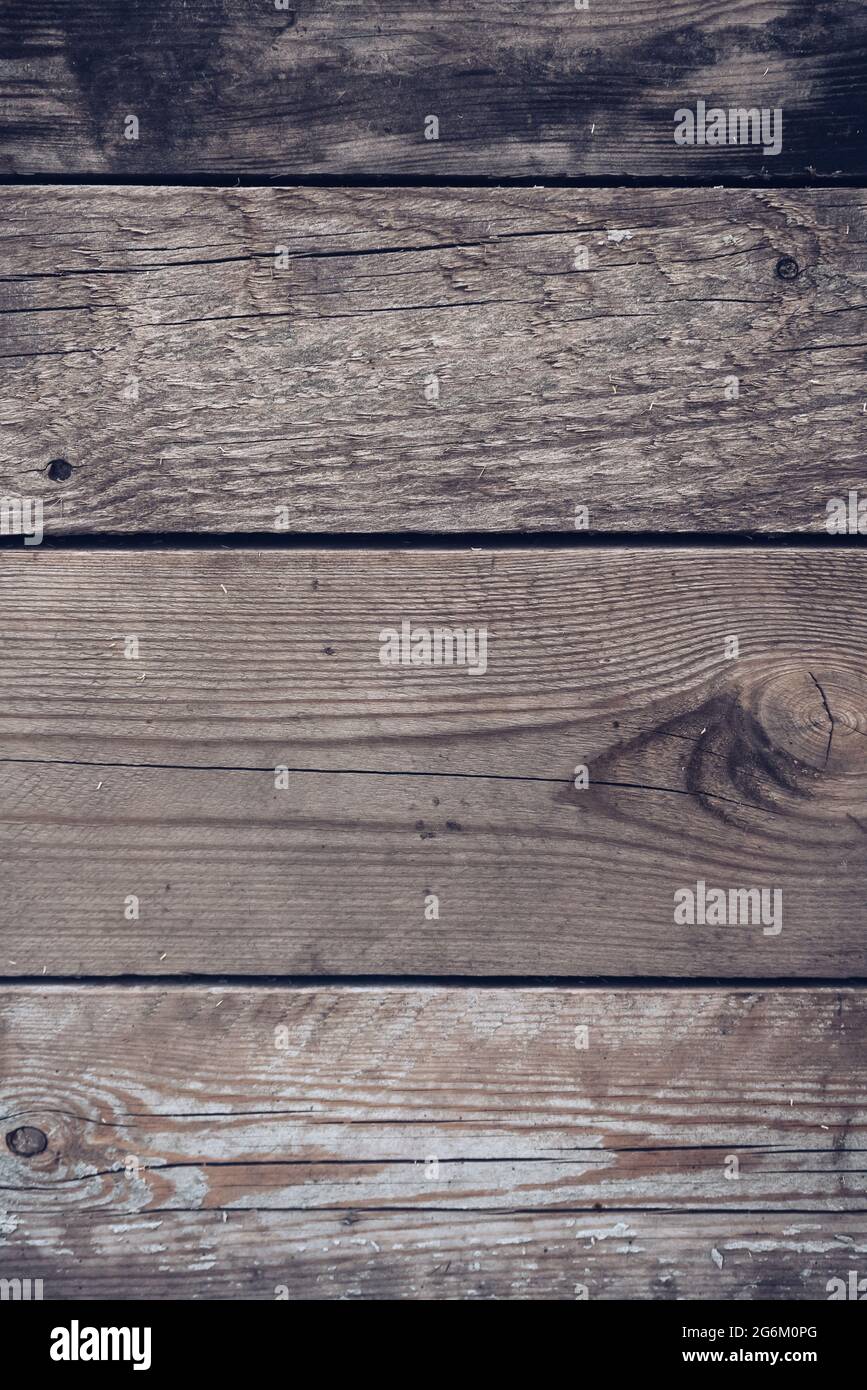 Vertikale Ansicht der verwitterten horizontalen Holzplanken Stockfoto