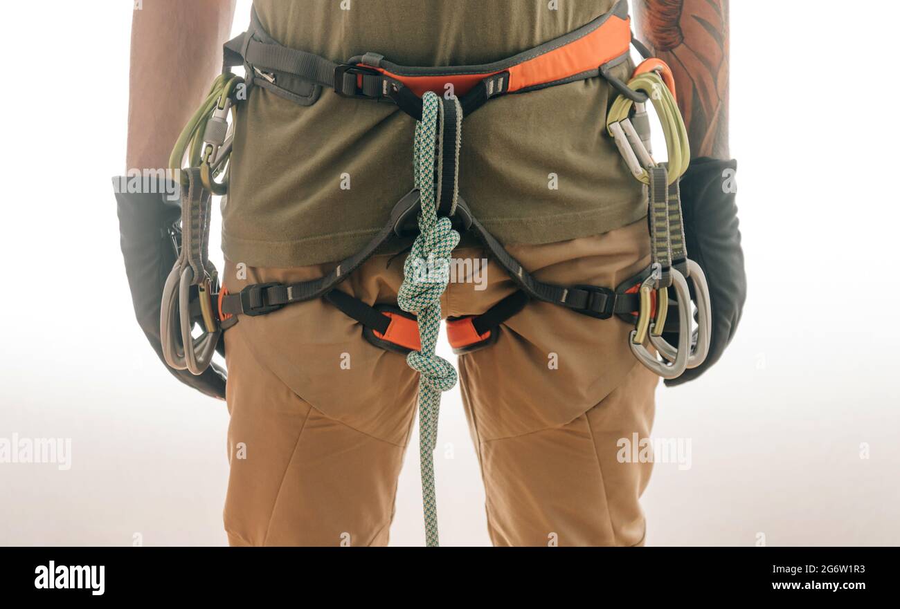 Das Seil am Gürtel ist zu einem speziellen Acht-Knoten gebunden. Stockfoto