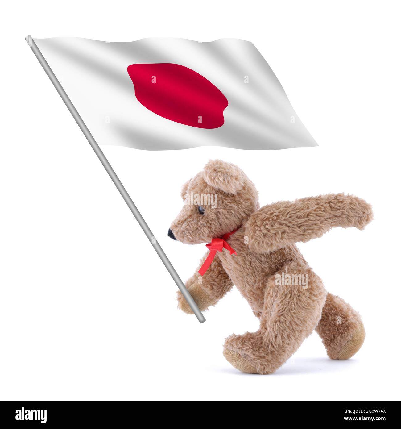 Die japanische Flagge wird von einem niedlichen Teddybären getragen Stockfoto