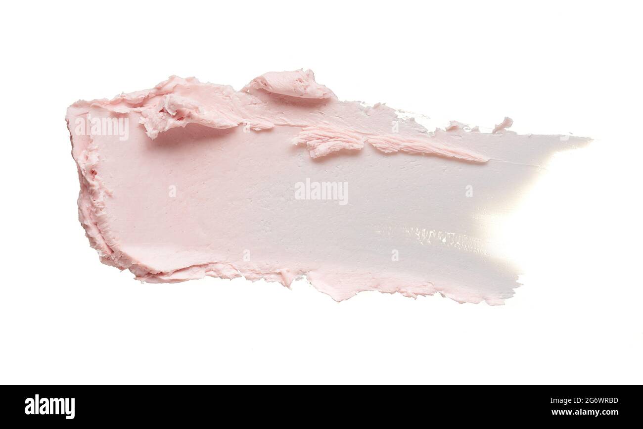 Sanft rosa Abstrich und Textur von Gesichtscreme oder Acrylfarbe isoliert auf weißem Hintergrund Stockfoto