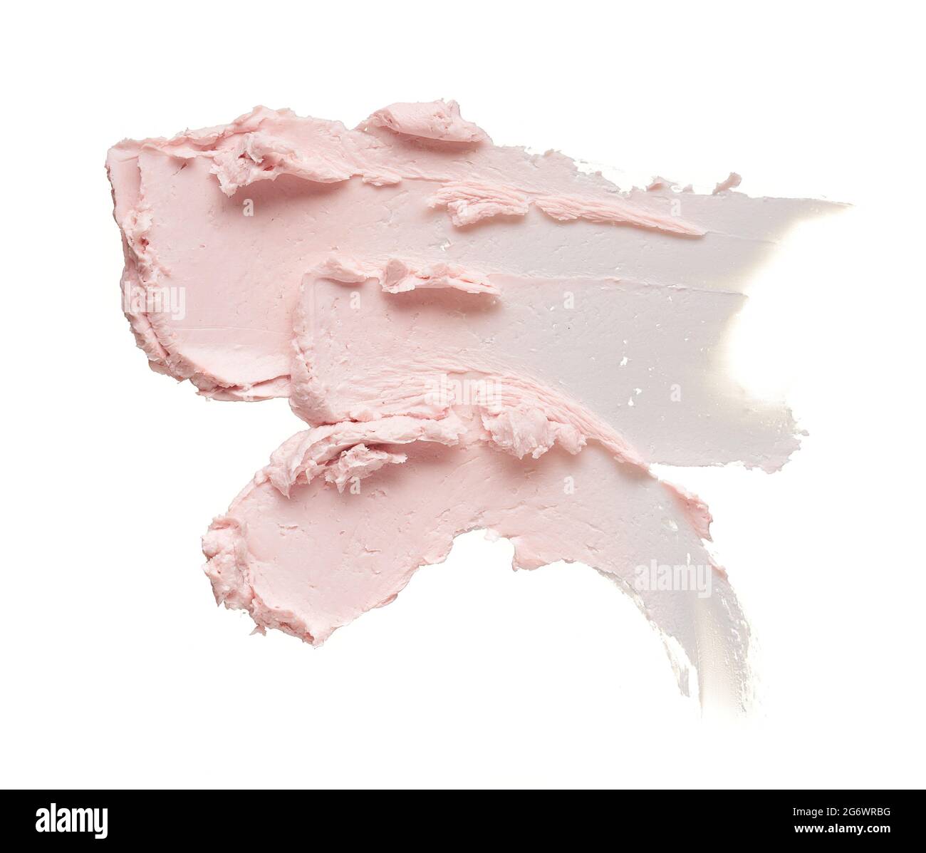 Sanft rosa Abstrich und Textur von Gesichtscreme oder Acrylfarbe isoliert auf weißem Hintergrund Stockfoto