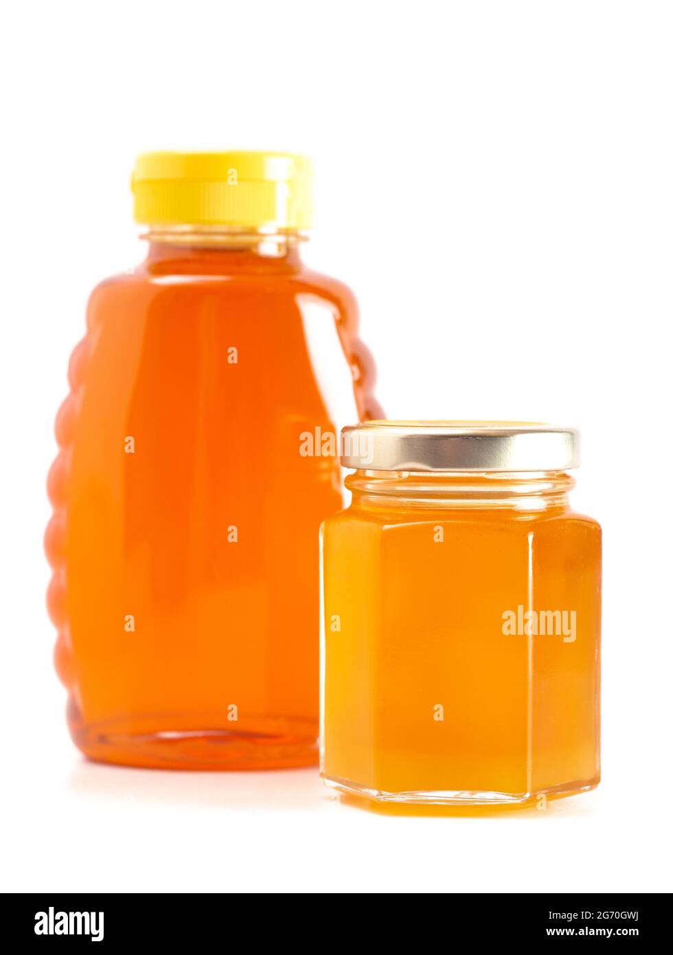 Gläser von rohem natürlichem Honig isoliert auf einem weißen Hintergrund Stockfoto