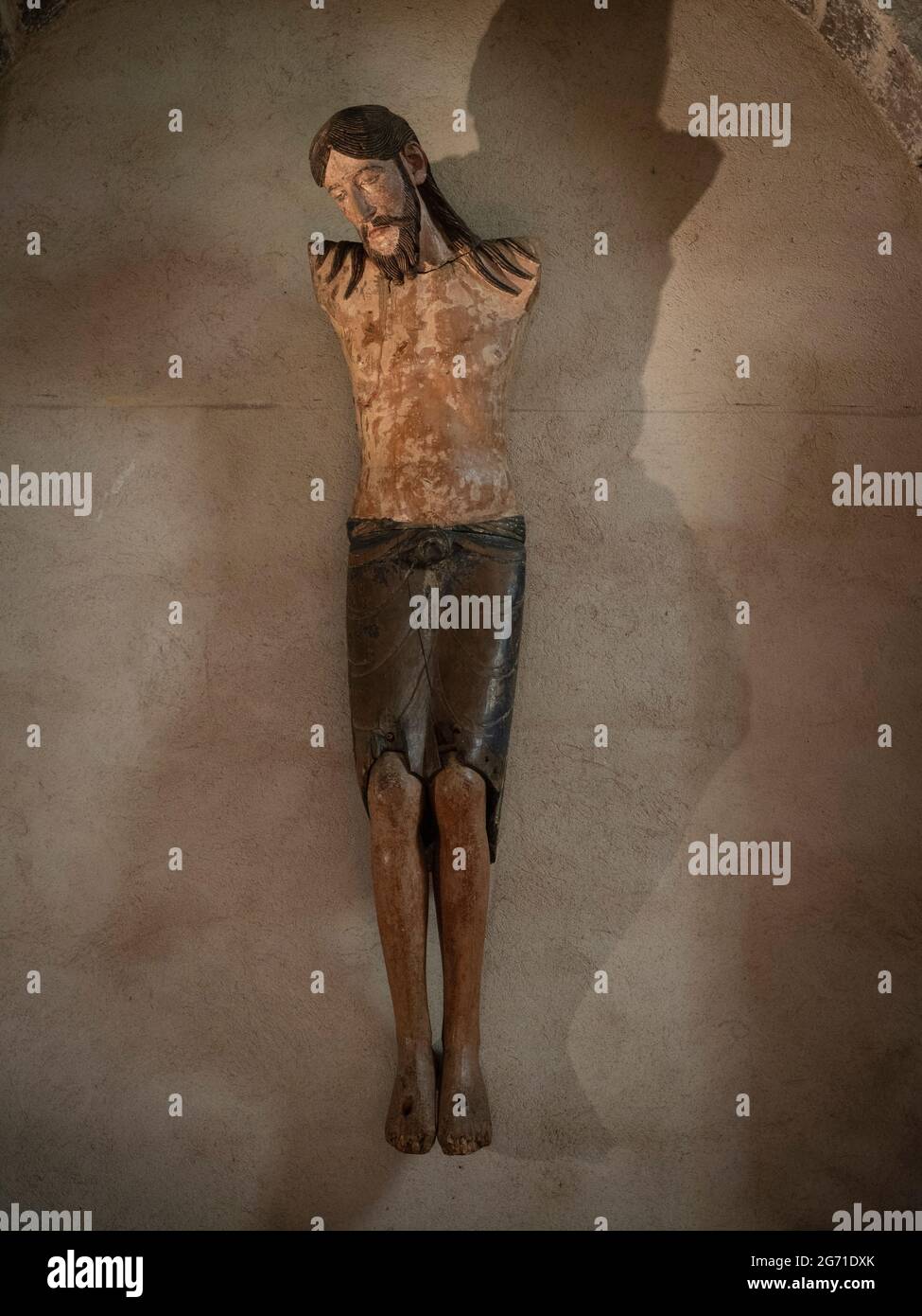 Skulptur des Christus ohne Waffen, Refektorium des romanischen Kreuzgangs der Abtei Saint-André, in Lavaudieu, Haute-Loire, Frankreich. Stockfoto