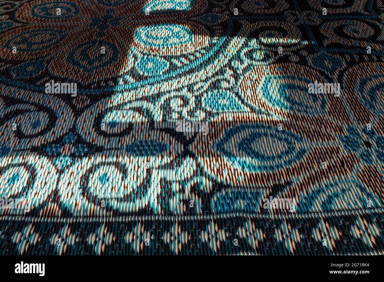Hintergrundbild eines blauen östlich inspirierten Teppichs Stockfoto