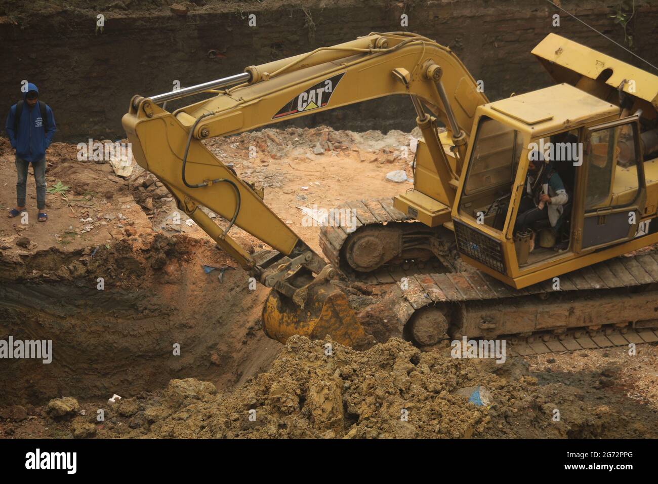 Mit dem Bagger werden Bauarbeiten durchgeführt Stockfoto