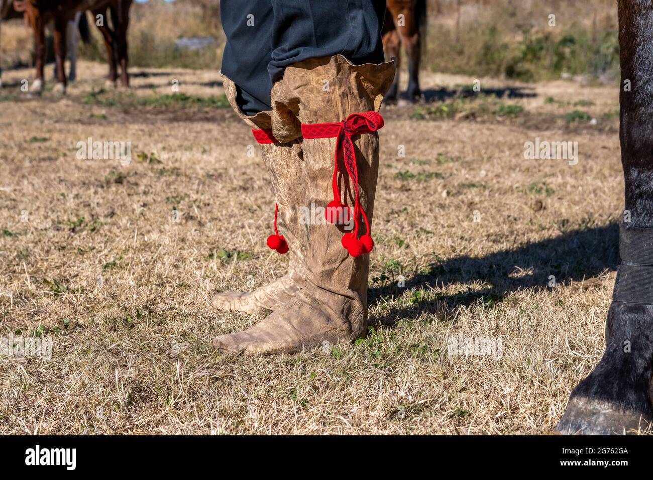 Eine Nahaufnahme von colt Stiefeln eines argentinischen Gauchos Stockfoto