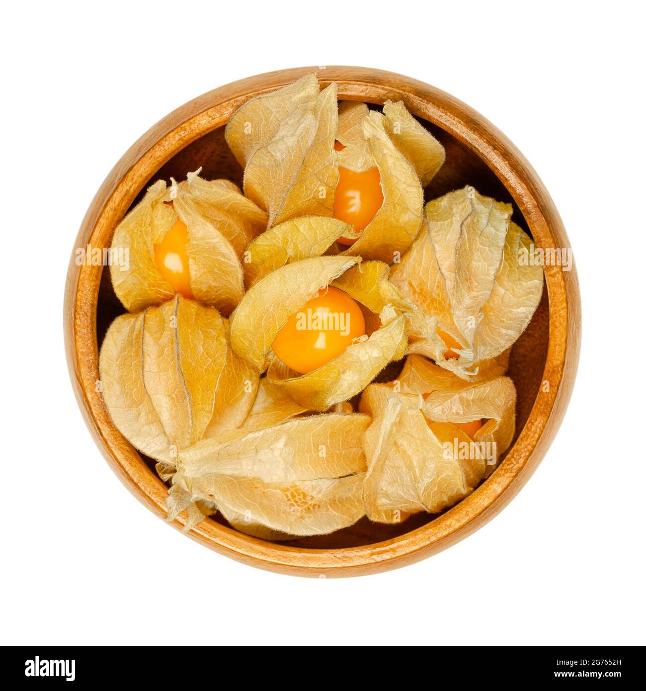 Kap Stachelbeeren mit teilweise offenem Kelch, in einer Holzschale. Frische Früchte von Physalis peruviana, auch golden, inka- und gemahlene Beere, uchuva und poha. Stockfoto