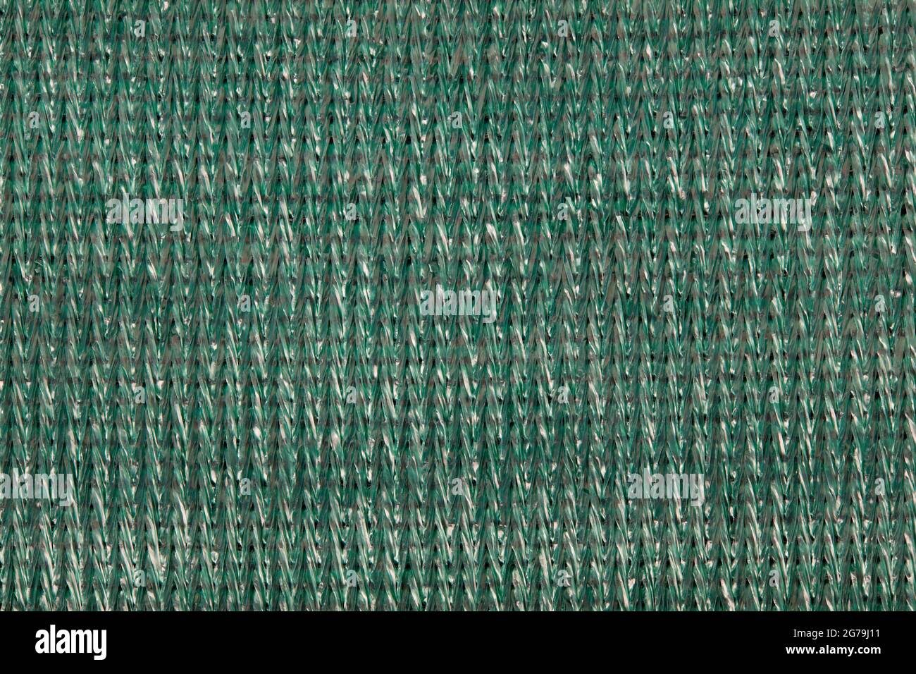 Grüner, reflektierender Kunststoff Stoff Textur Hintergrund Stockfoto
