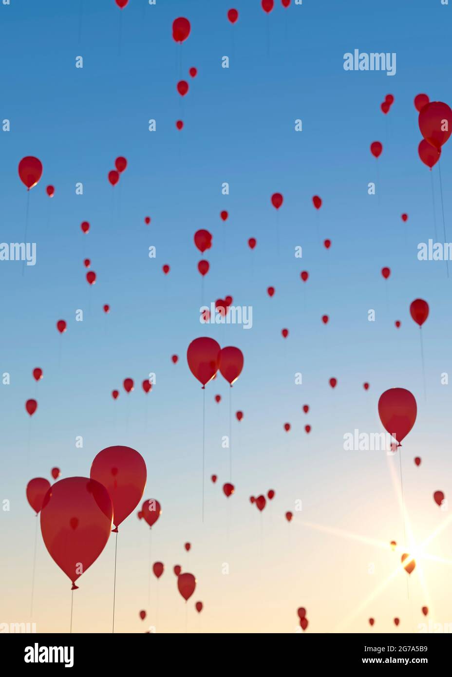 Hunderte von roten Ballons werden beim 3D-Rendering bei Sonnenuntergang veröffentlicht Stockfoto