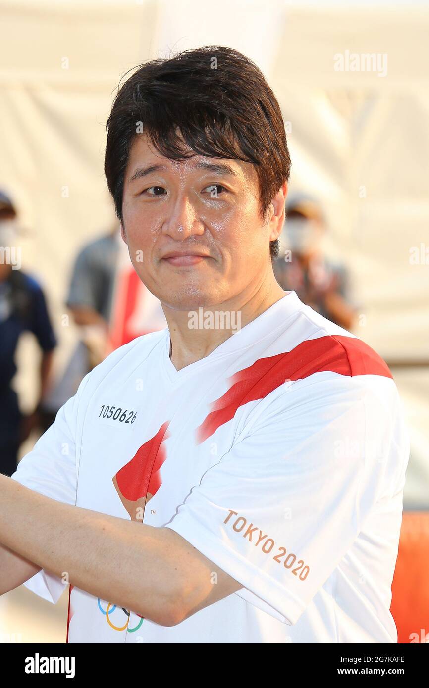 Tokio, Japan. Juli 2021. Fackelträger, Krammlehrer, Osamu Hayashi, Performances. Der olympische Fackellauf von Tokio 2020 fand am 14. Juli 2021 auf der Rennstrecke von Tokio in Fuchu statt. Quelle: SIPA USA/Alamy Live News Stockfoto