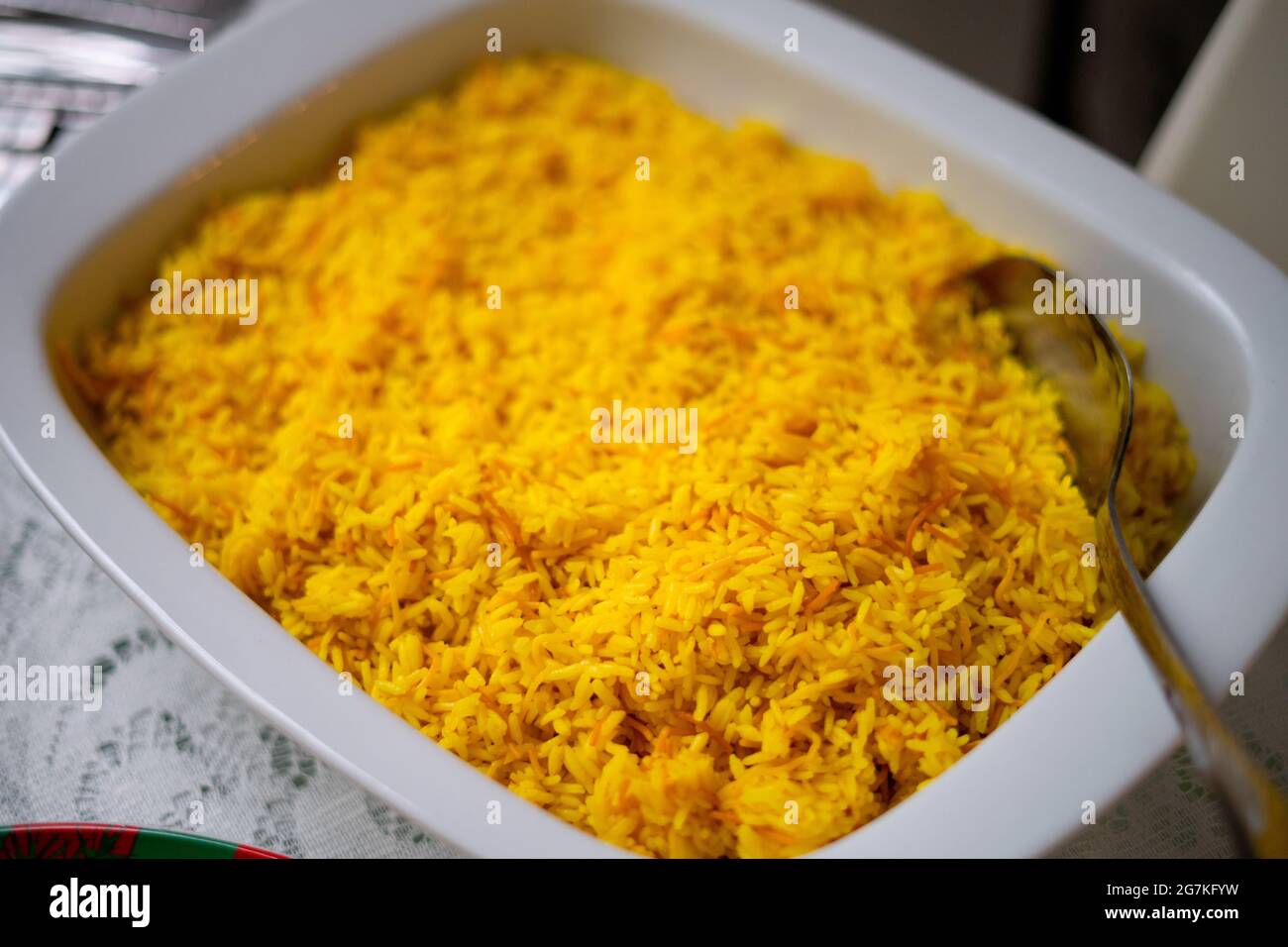 CENA, COMIDA NAVIDEÑA, ARROZ Y LECHÓN. CERDO. Stockfoto