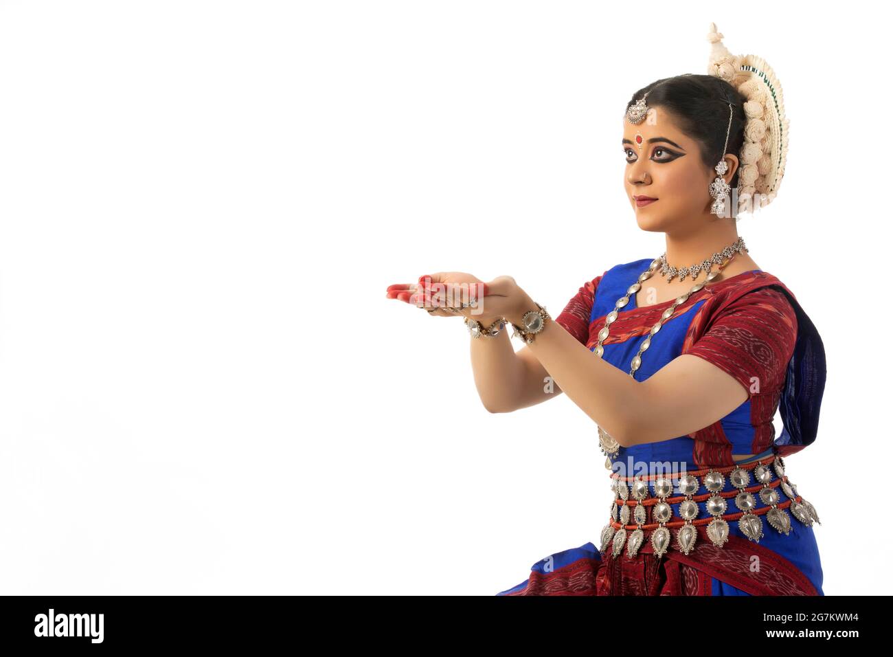 Odissi Tänzerin mit Pushpanjali Mudra Stockfoto