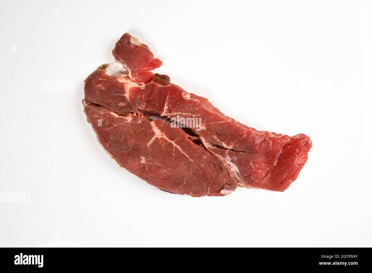 Ein Roastbeef Steak isoliert auf einer weißen Oberfläche Stockfoto