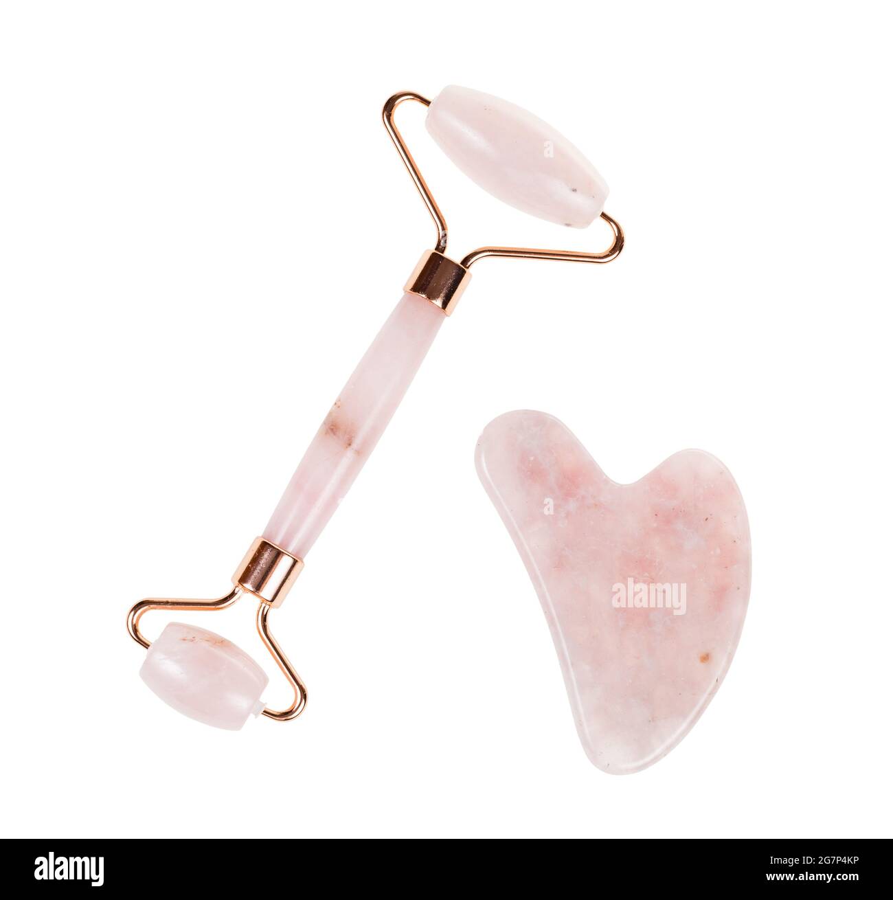 Werkzeuge für die traditionelle chinesische Gesichtsmassage Gua Sha aus natürlichem Rosenquarzstein auf weißem Hintergrund isoliert Stockfoto