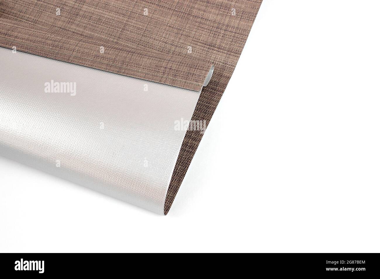 Sonnen- und Hitzeschutz. Rollläden sind aus Texturmaterial hergestellt. Close up roman blind oder Roller blind Leinenstoff Textur Probe. Stockfoto