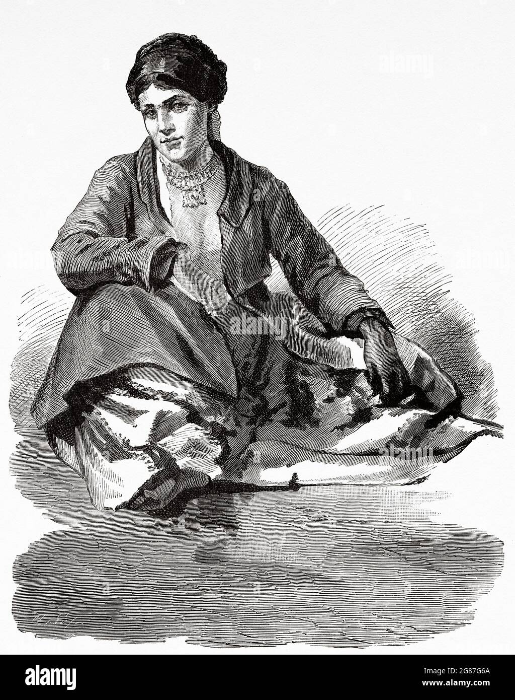 Schöne ägyptische Frau aus dem 19. Jahrhundert in typischen Kostümen der Zeit, Ägypten, Nordafrika gekleidet. Alte Illustration aus dem 19. Jahrhundert von El Mundo Ilustrado 1880 Stockfoto