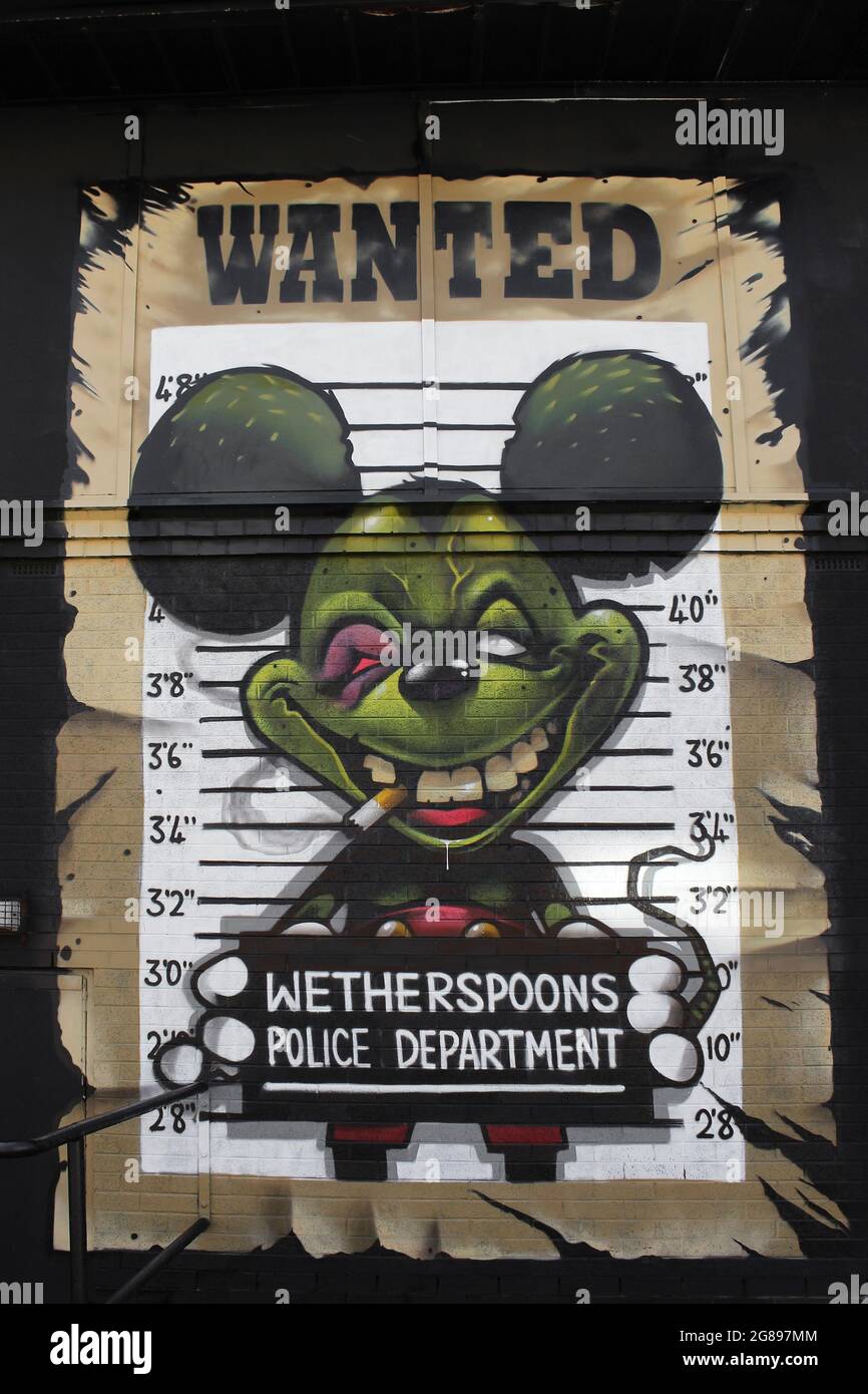 Komisches Mickey Mouse Wanted Sign, mit freundlicher Genehmigung der Wetherspoons Polizeibehörde Stockfoto