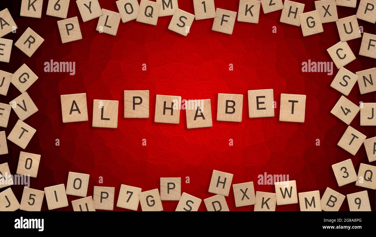 Draufsicht des Wortes Alphabet mit Holzbuchstaben mit verstreuten Buchstaben im Hintergrund Stockfoto