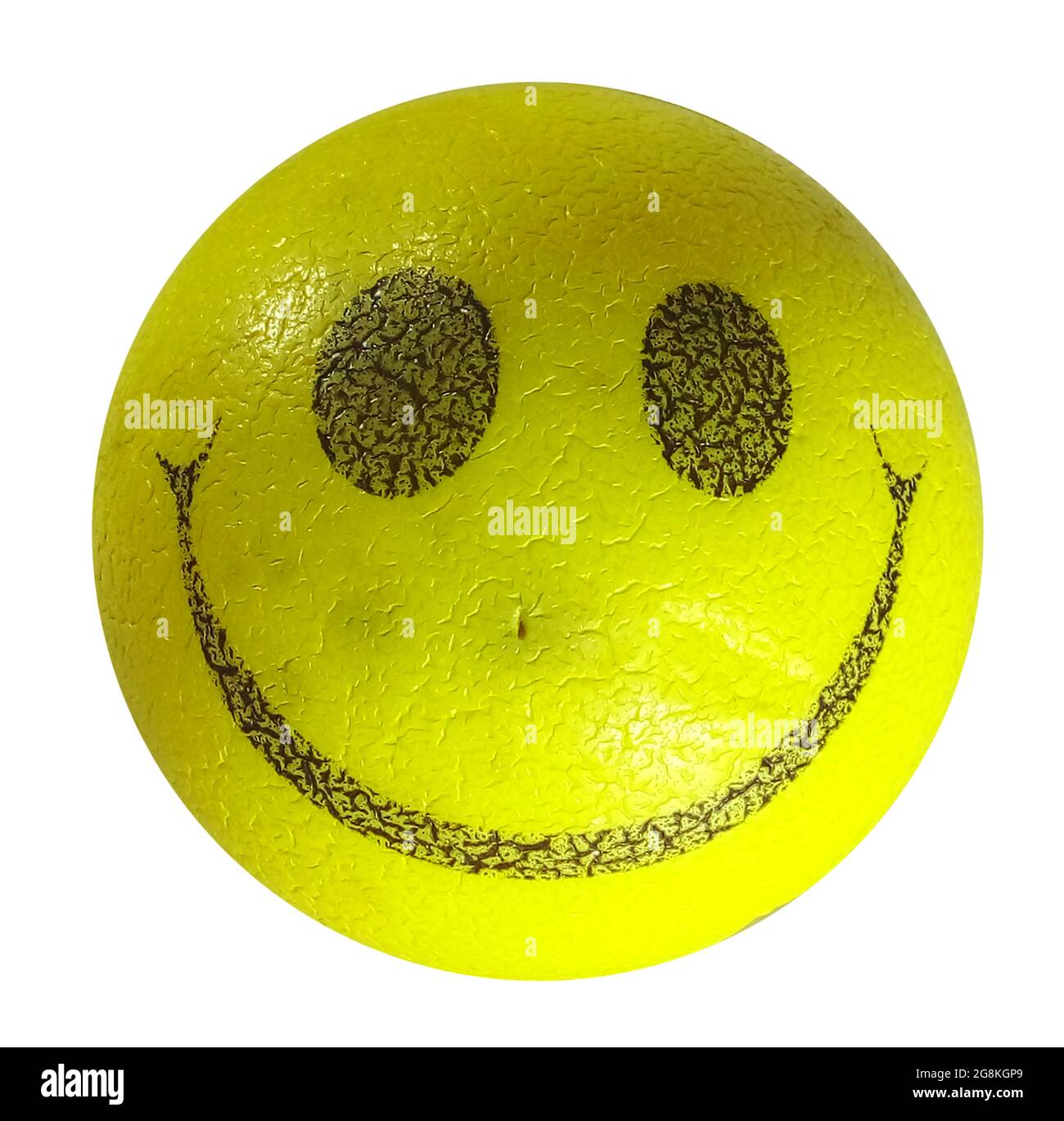 Gelbe Kugel mit einem Smiley-Gesicht auf einem isolierten Hintergrund Stockfotografie