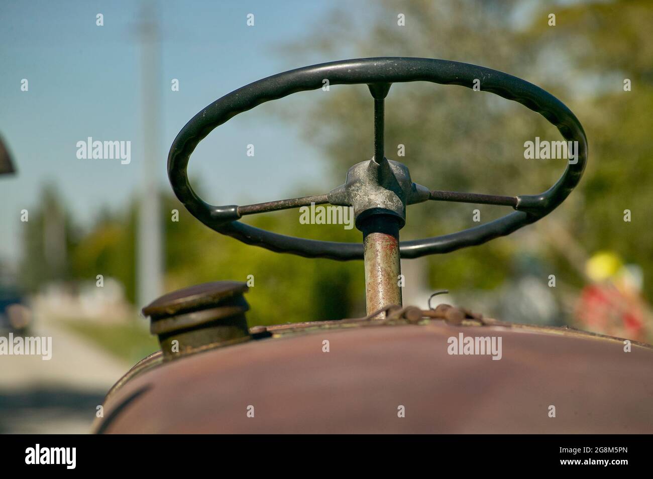 Detail der landwirtschaftlichen Traktor Lenkrad mit selektivem Fokus Stockfoto