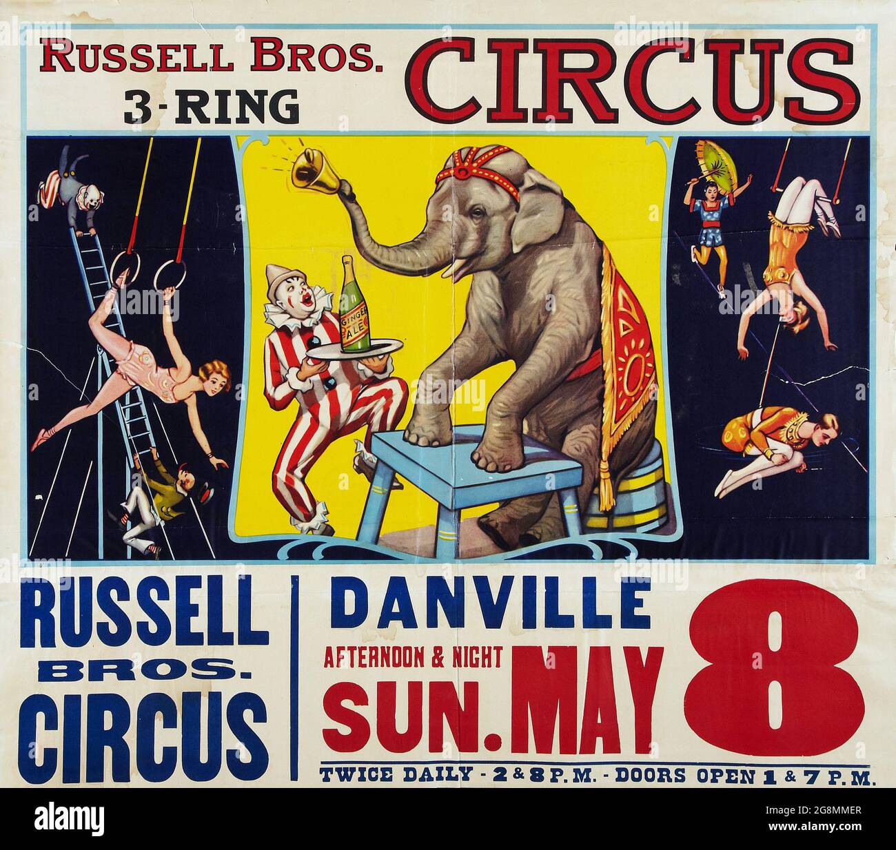 Vintage Circus Poster Russell Bros. Circus in Danville (Russell Brothers 3-Ring Circus, 1938). Mit einem Clown, der einen Elefanten serviert. Stockfoto