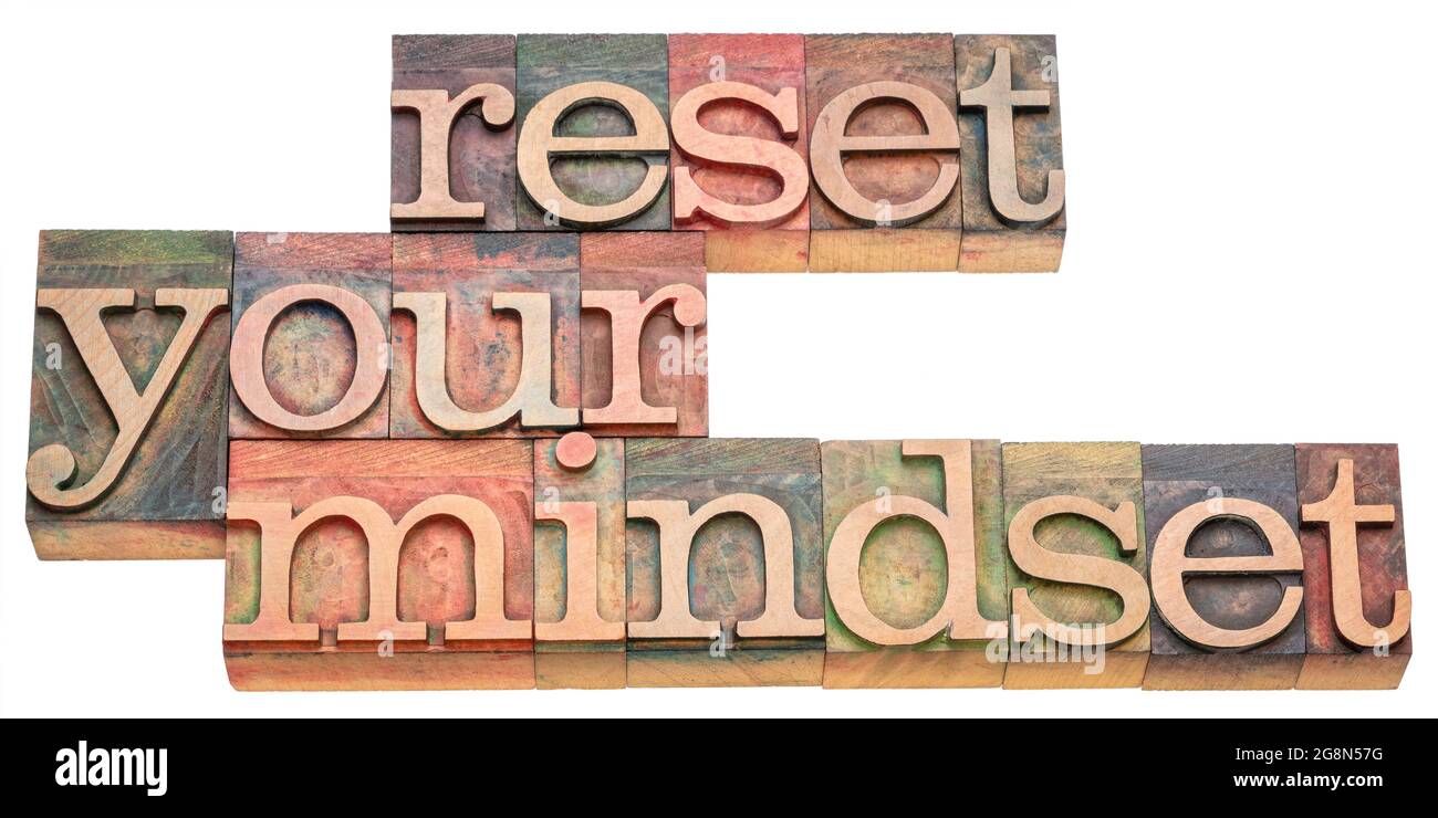 Reset your Mindset Beratung - isoliert Wort abstrakt in Vintage-Buchdruck Holzart, Selbstverbesserung und persönliche Entwicklung Konzept Stockfoto