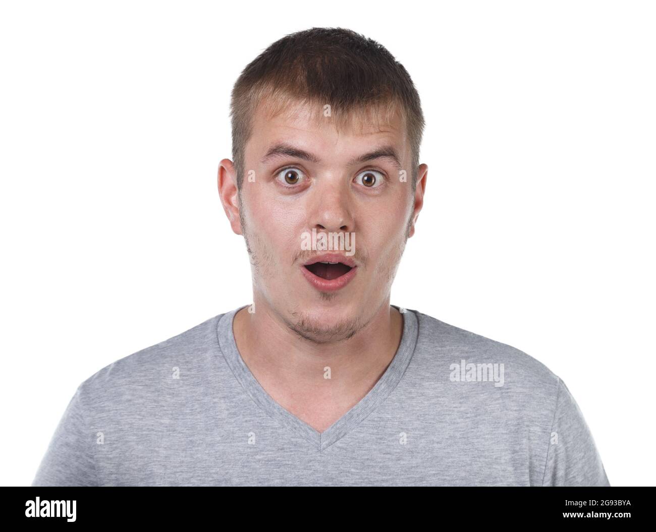 Bild eines überraschten jungen Mannes mit Borsten Stockfoto
