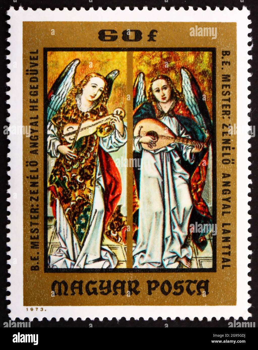 UNGARN - UM 1973: Eine in Ungarn gedruckte Briefmarke zeigt Engel, die Violine und Laute spielen, Gemälde des ungarischen anonymen frühen Meisters aus dem Chri Stockfoto