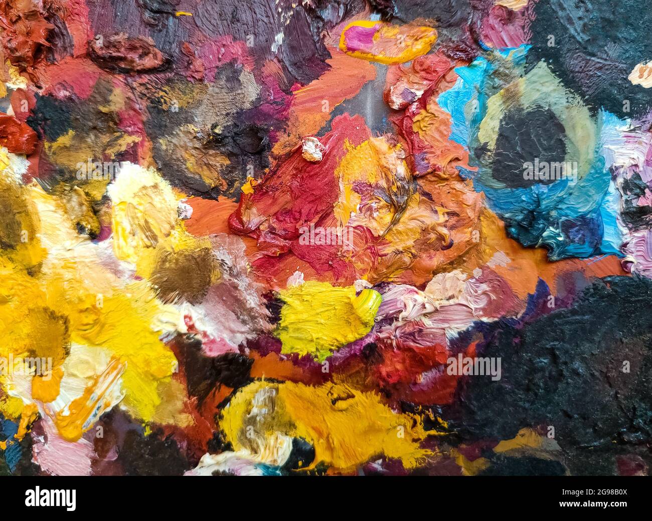 Palette mit Ölfarben - abstrakt gefärbter Hintergrund Stockfoto