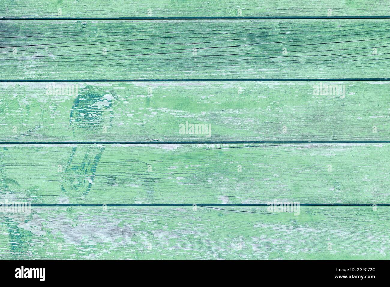Holzhintergrund mit grünen Dielen Stockfoto