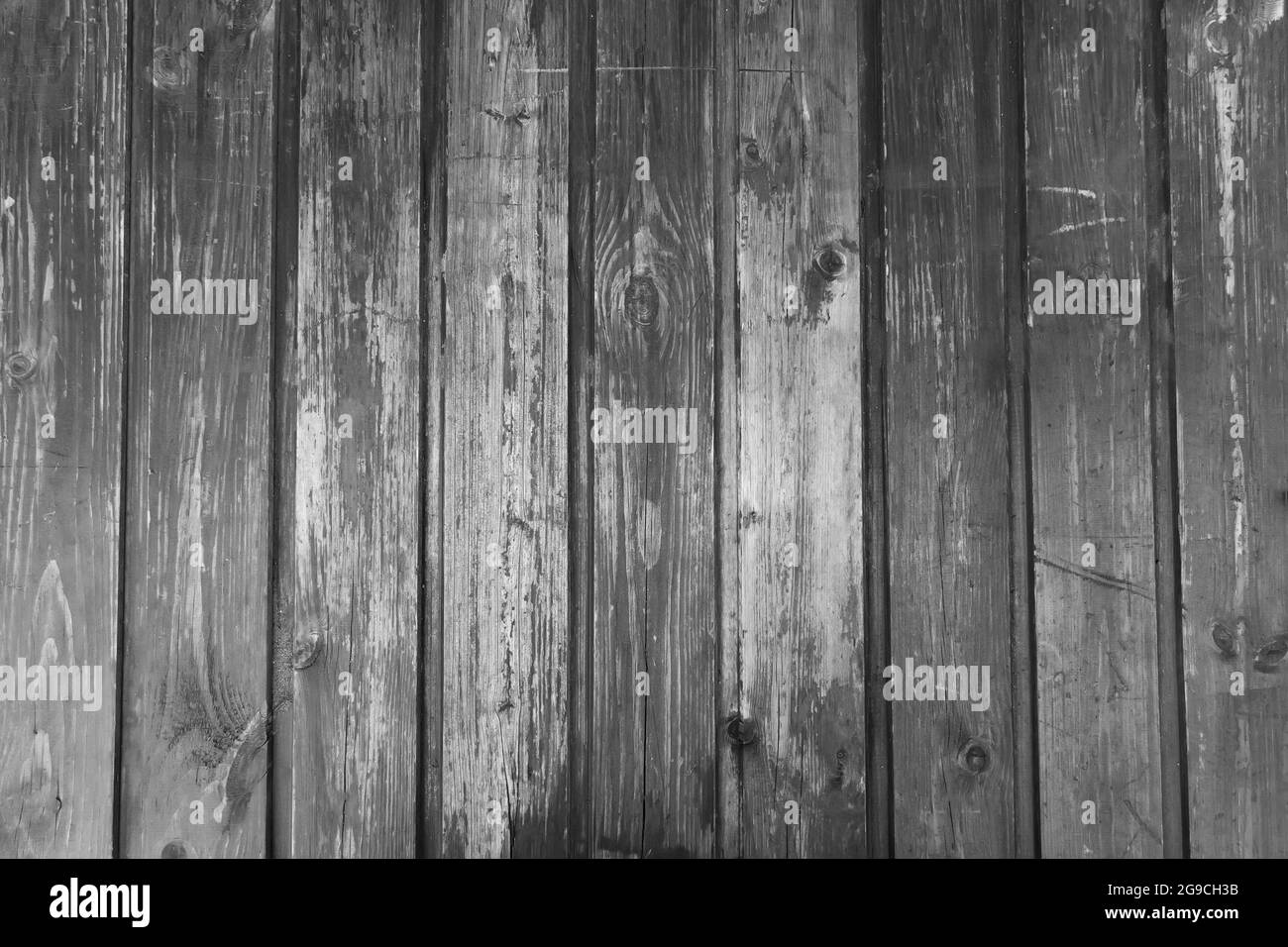 Alte bemalte Holzbretter. Schwarzer und weißer Hintergrund Stockfoto