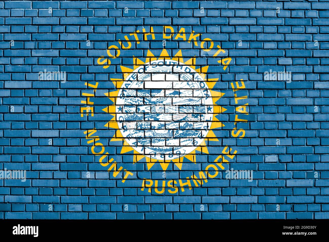 Flagge von South Dakota, USA auf Ziegelmauer gemalt Stockfoto
