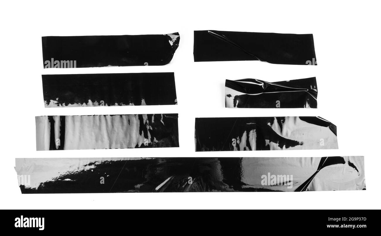 Zerrissene verschiedene Größe schwarzes Klebeband, Klebestücke Stockfoto