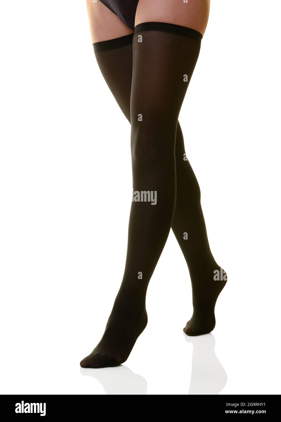 Womans Beine in schwarzen Strümpfen, Nahaufnahme, ausgeschnitten Stockfoto