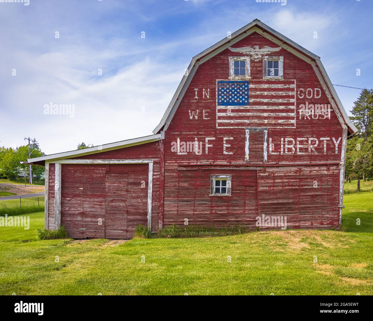 „in god we Trust“-Scheune in Latah, einer Stadt im Spokane County, Washington Stockfoto