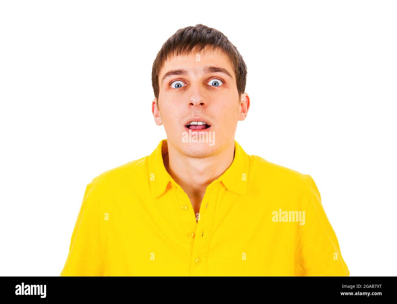 Überrascht junger Mann auf dem weißen Hintergrund Nahaufnahme Stockfoto