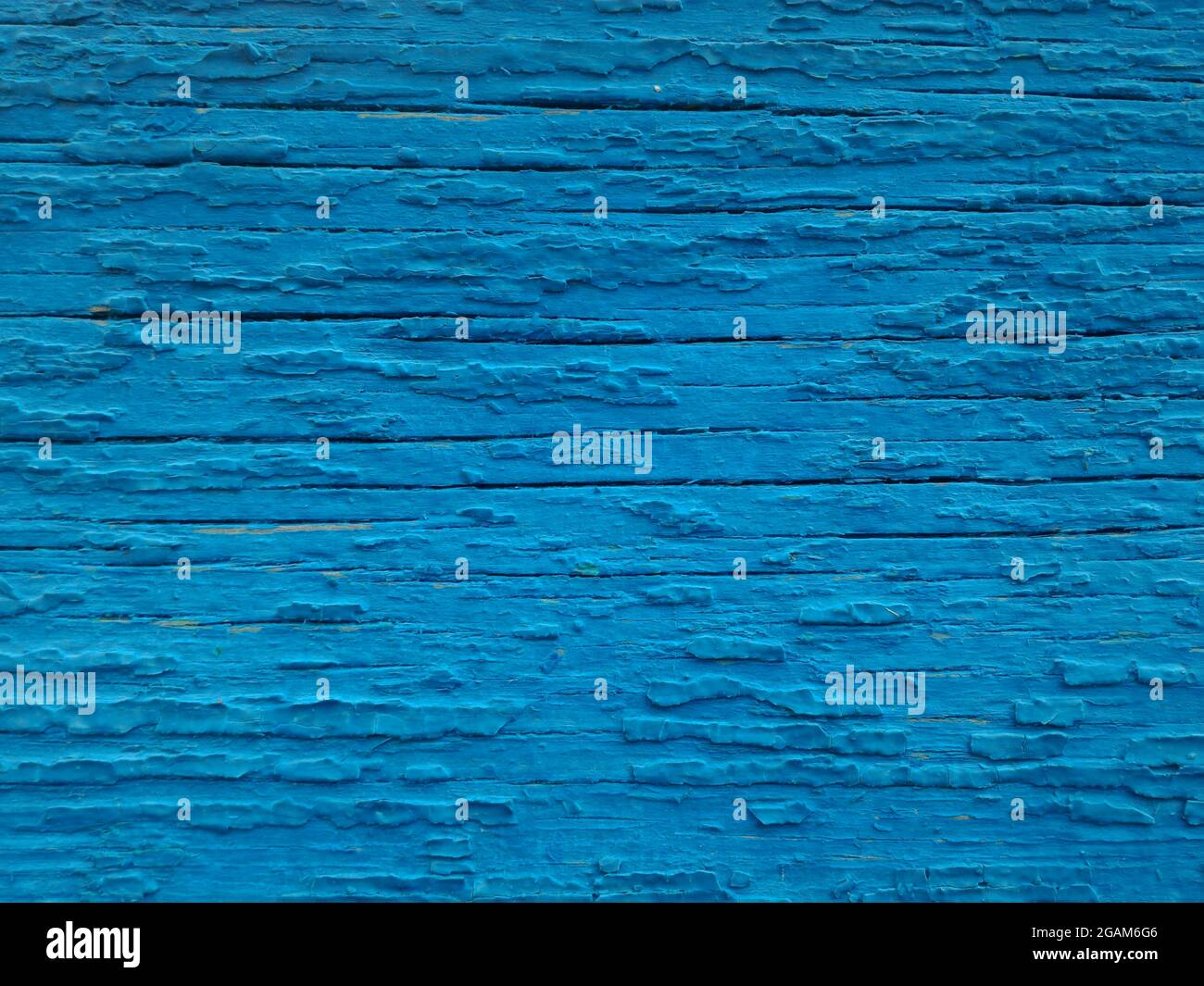 Textur der alten Farbe auf der Holzoberfläche. Hintergrund von gesprungener blauer Farbe, Nahaufnahme Stockfoto