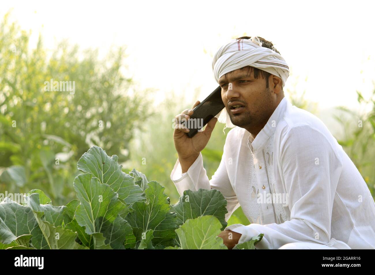 Glücklicher indischer Bauer Stockfoto