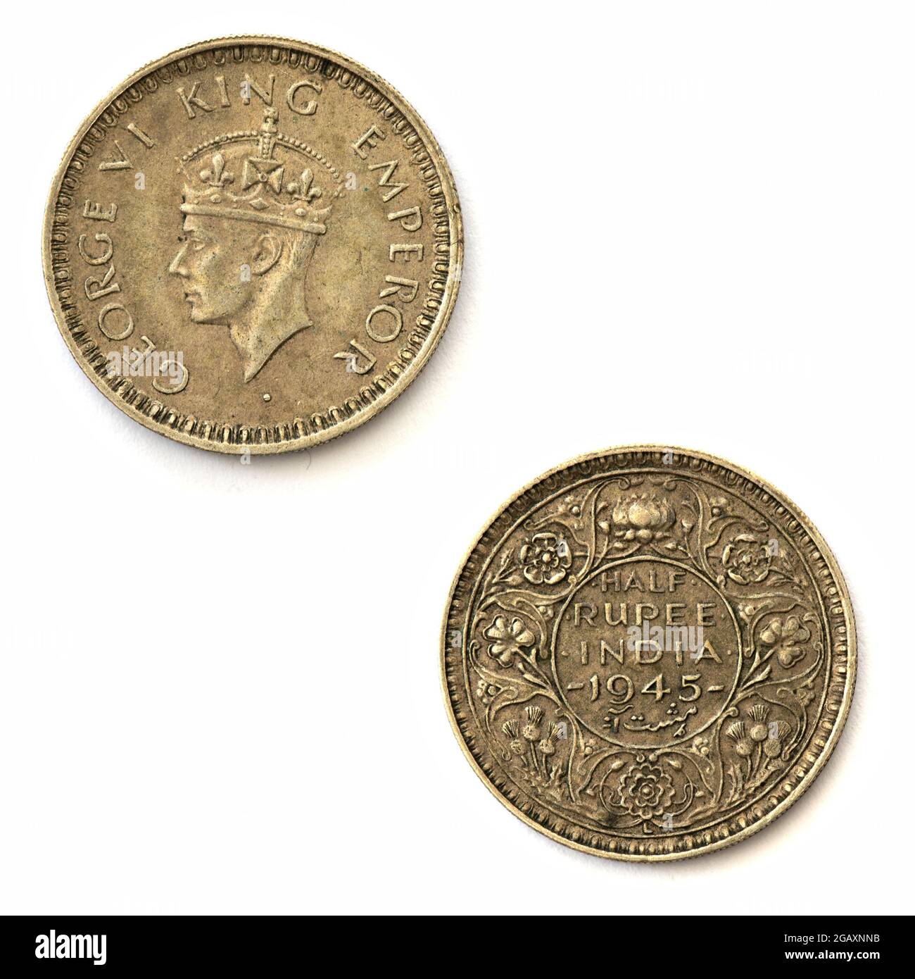 Indische Präunabhängigkeit eine Rupie-Münze mit George 6. (1945) gestochen von Percy Metcalfe. Geprägt in der Münzstätte von Lahore. Stockfoto