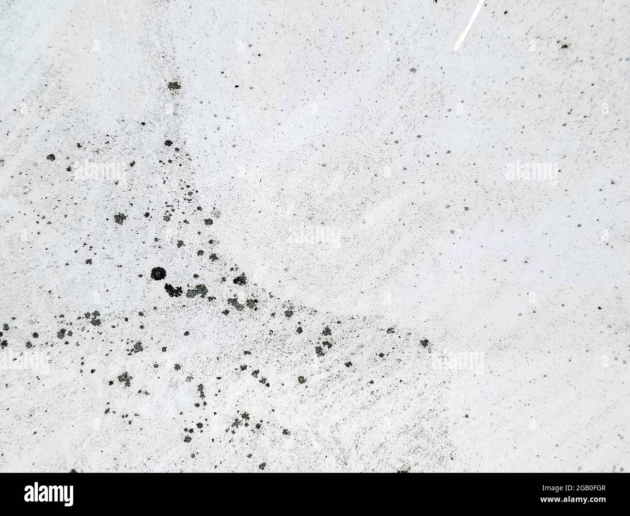 Abstraktes gesprenkeltes Farbmuster auf grauem weißem Hintergrund Stockfoto