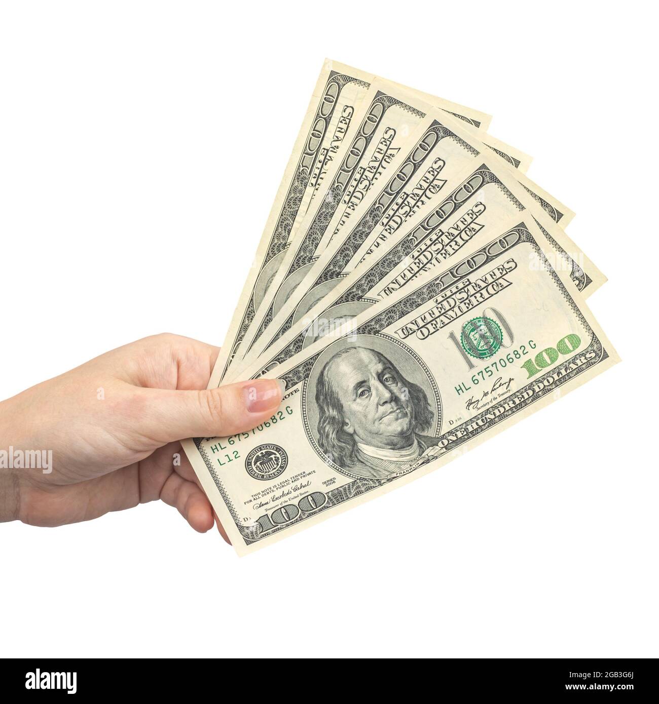 Die Hand der Frau hält einen Stapel us-Dollar, 100 Banknoten. Finanz-, Ertrags-, Gutschriftierungskonzept. Isoliert auf weißem Hintergrund Stockfoto