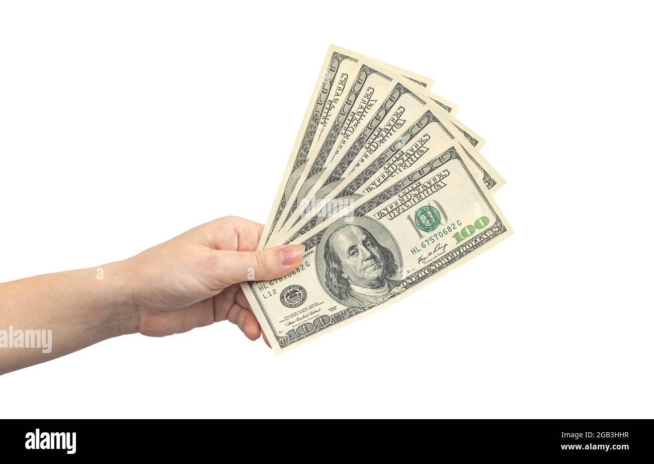 Die Hand der Frau hält us-Dollar, 100 hundert Scheine. Finanz-, Ertrags-, Gutschriftierungskonzept. Isoliert auf weißem Hintergrund Stockfoto