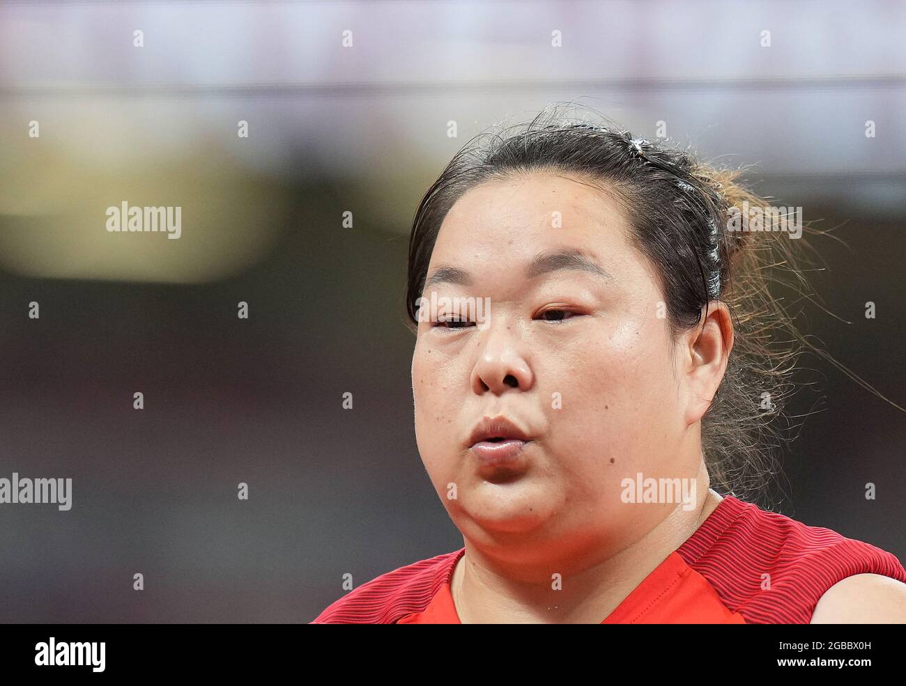 (210803) -- TOKIO, 3. August 2021 (Xinhua) -- Wang Zheng aus China reagiert während des Frauen-Hammerwerf-Finales bei den Olympischen Spielen 2020 in Tokio, Japan, am 3. August 2021. (Xinhua/Lui Siu Wai) Stockfoto
